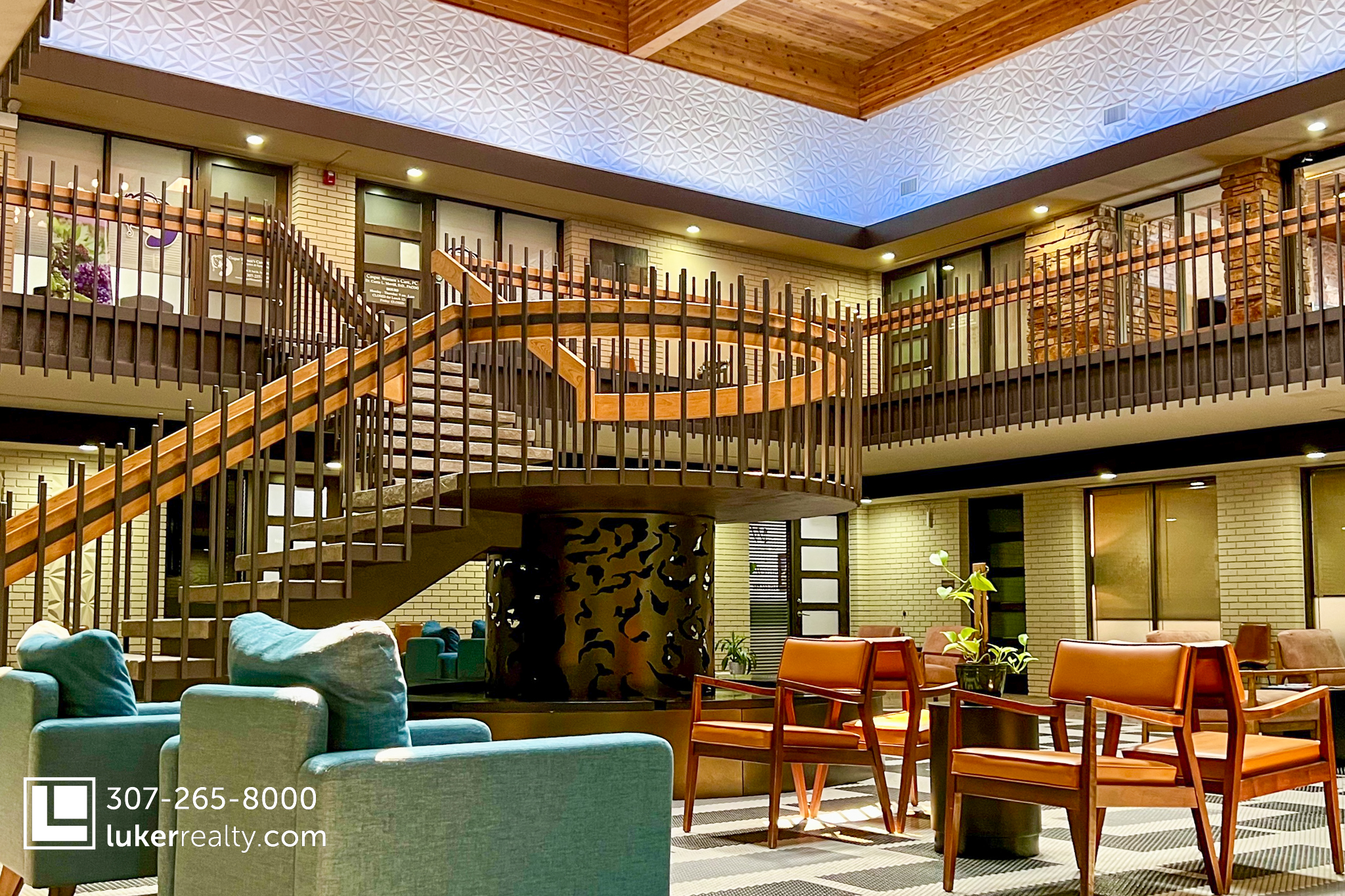 Interior atrium with spiral staircase and lounge seating